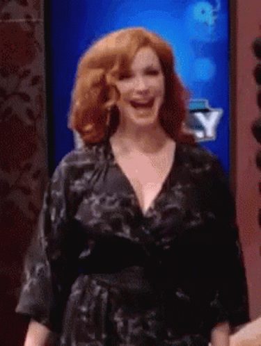 Christina Hendricks Sexy Walk While Smiling GIF
