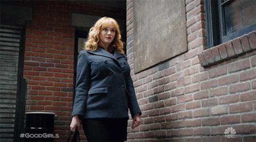 Christina Hendricks Walking In The Hallway GIF