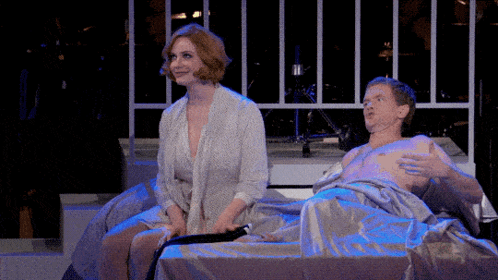 Christina Hendricks With A Man In Bed GIF