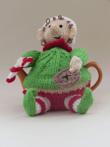 Christmas Elf Stuffed Toy With Candy Cane GIF