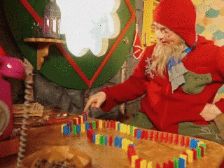Christmas Season Domino Falling GIF