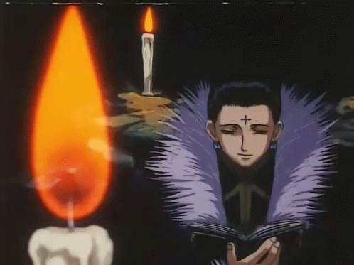 Chrollo With Book In The Dark GIF