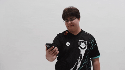 Chubby Guy Looks At Phone But Not Again GIF