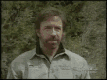 Chuck Norris Thumbs Up Face Hit Oar Pass GIF