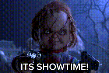 Chucky Doll Holding Gun It's Showtime