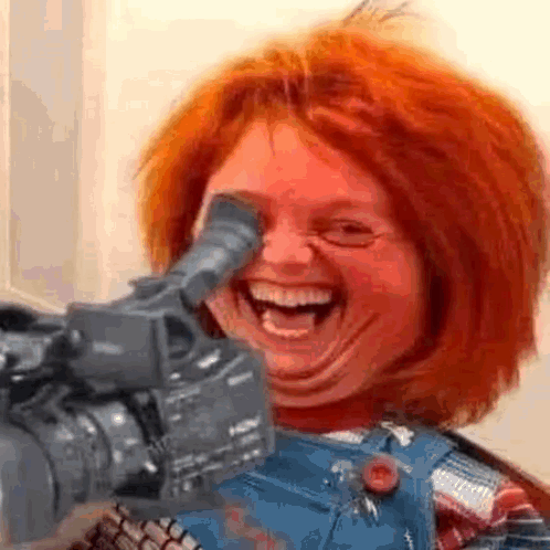 Chucky Doll Laughing Holding Camera
