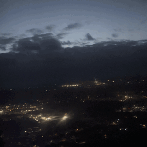 City at Night with Cloudy Sky