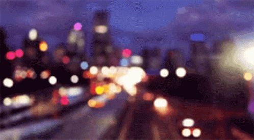 City At Night With Purple Sky GIF