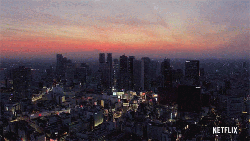 City at Sunset with Netflix Logo