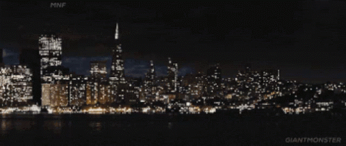 City Skyline At Night With Giant Monster GIF
