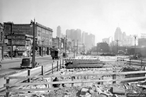 City Street with Fence and New Ring Sign
