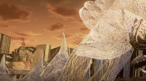 City With Large White Flower in Foreground