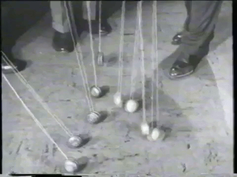 Classic Amazing Crowd Performing Yoyo Tricks GIF