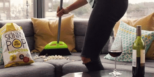 Cleaners Sweep The Living Room's Mess GIF