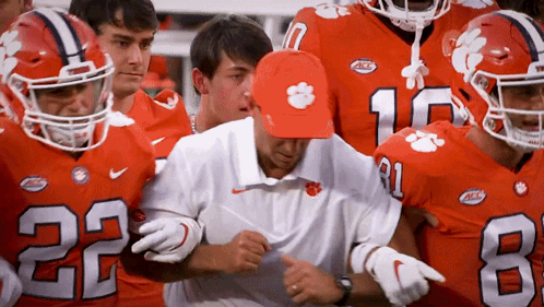Clemson Football Players Gathered Around Coach
