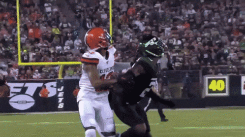 Cleveland Jersey Player Tackled by Black Jersey