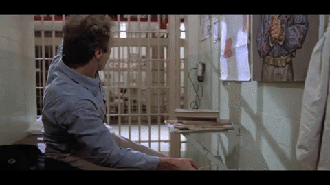 Clint Eastwood Candle Jail GIF