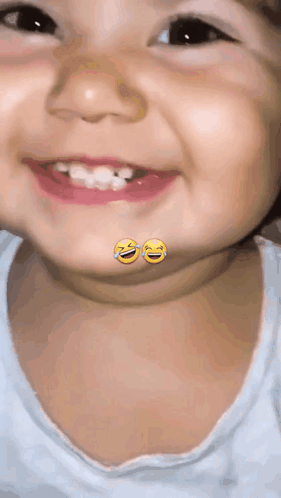 Close Up Baby Face With Laughing Emojis