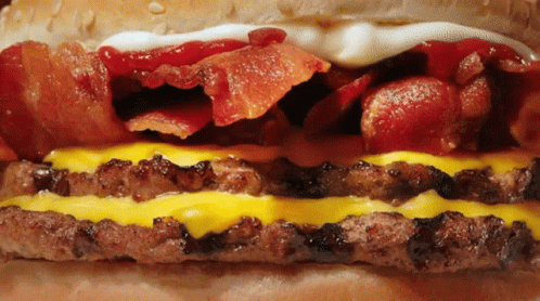 Close Up Bacon Cheeseburger with Ketchup and Mayonnaise