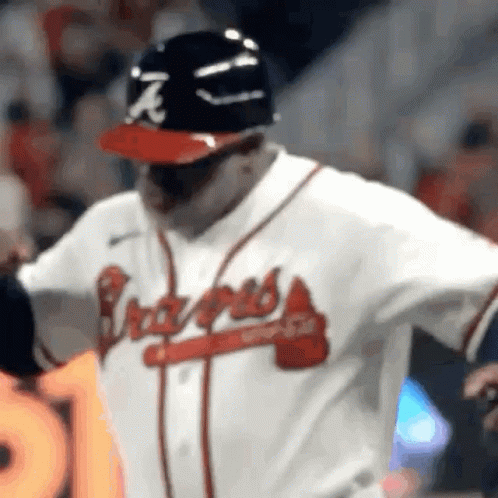 Close-Up Baseball Player in Braves Jersey and Helmet