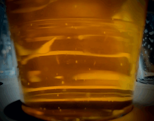 Close Up Beer Glass With Bubbles