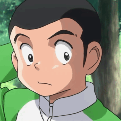 Close-Up Boy in Green Shirt