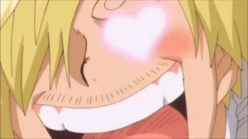Close Up Face Blowing Heart