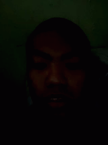 Close Up Face in Dark With Eyes Closed