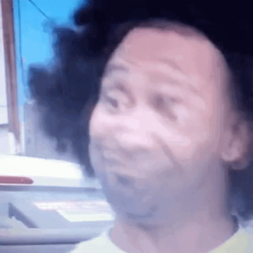 Close Up Face On Blue Background GIF