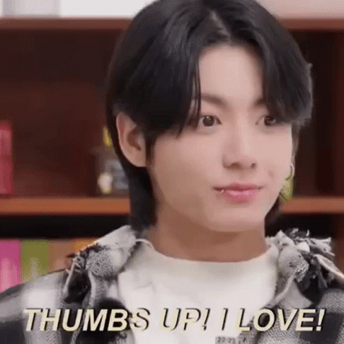 Close Up Face Saying Thumbs Up I Love