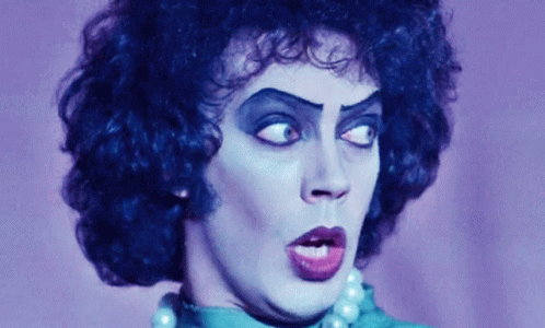 Close Up Face With Makeup and Pearls