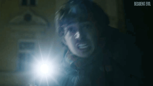 Close Up Face With Resident Evil Text GIF