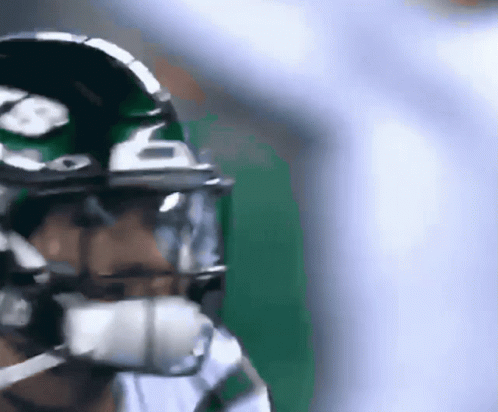 Close-Up Football Player Helmet Number 6 GIF