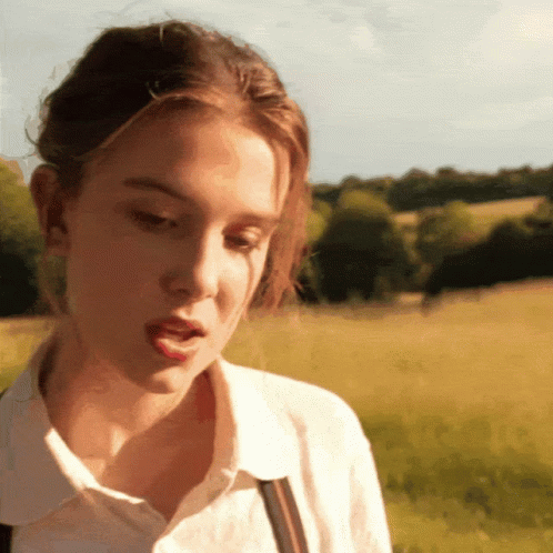 Close Up Girl in White Shirt and Vest