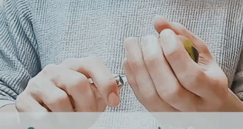 Close-Up Hands Holding Glass