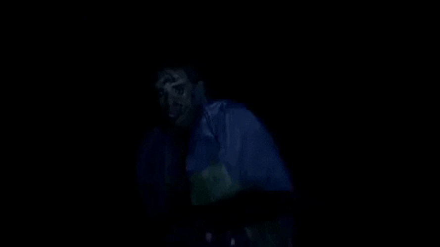 Close-up Leatherface Attacking GIF