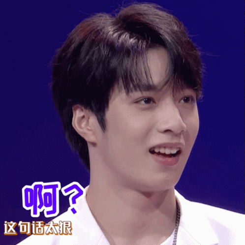 Close Up Man Face With Chinese Writing GIF