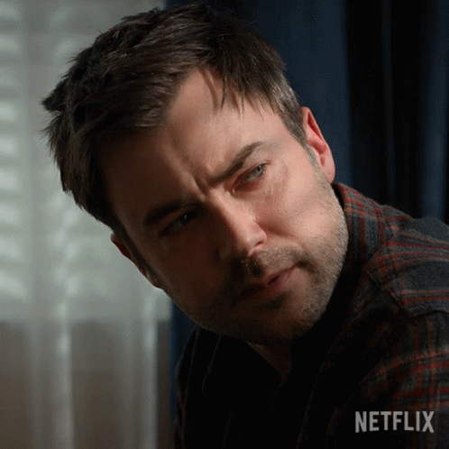 Close-Up Man Face With Netflix Logo