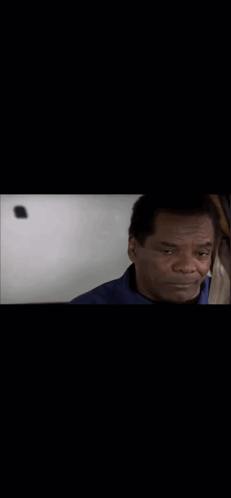Close Up Man's Face Black Background GIF