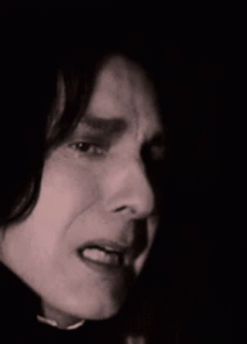 Close Up Man's Face Dark Background GIF