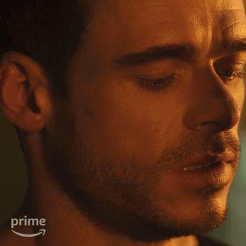 Close Up Man's Face With Amazon Prime Logo GIF