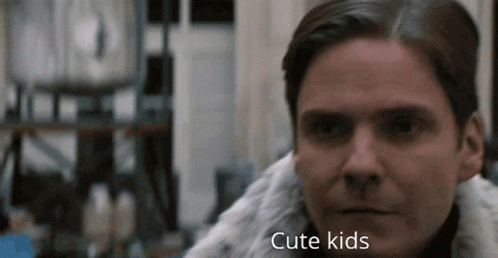 Close Up Man's Face With Cute Kids