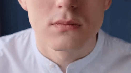 Close Up Man's Mouth White Shirt Blue Background GIF