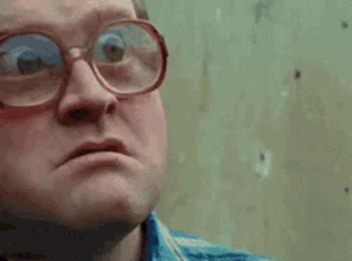 Close Up Man Wearing Glasses Making a Face