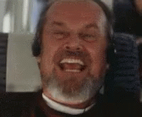 Close Up Man With Beard and Headphones on Plane