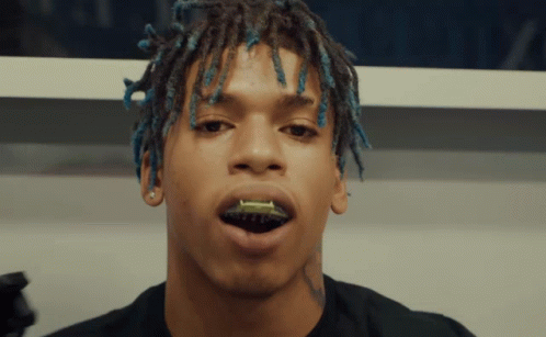 Close Up Man With Blue Dreadlocks GIF