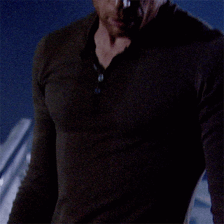 Close-Up Man With Buttons on Shirt