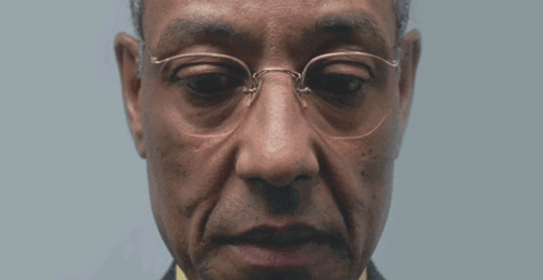 Close Up Man With Glasses And Suit GIF