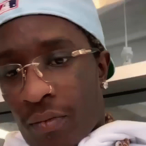 Close Up Man With Glasses Nose Ring And Hat GIF