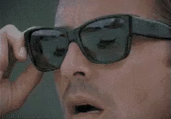 Close Up Man With Sunglasses and Lighter